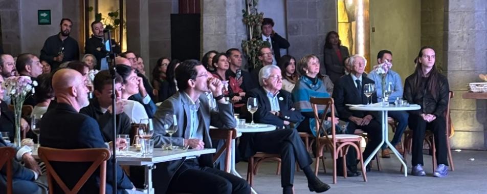 Audiencia en evento corporativo — EPA Creatividad